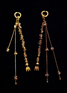 Pair of gold earrings.