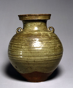 Celadon glazed jar with foru handles.