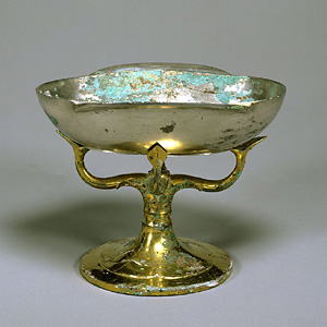 Silver ear cup with gilt bronze stand.