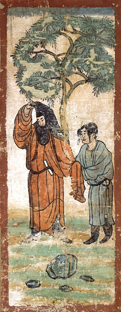 Figures under a tree.