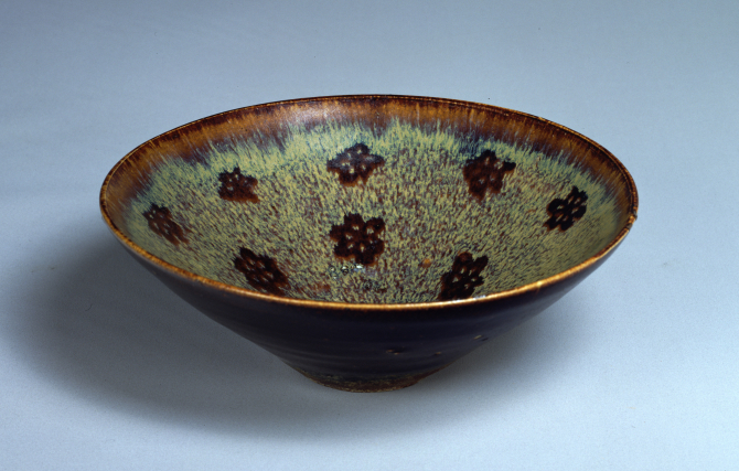 Image of "Tenmoku Tea Bowl with a “Tortoiseshell” Glaze and Plum Blossoms"