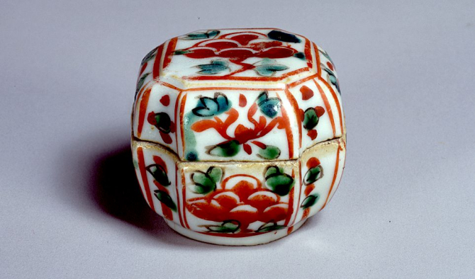 Image of "Incense Container with Flowering Plants"