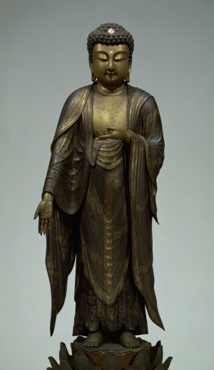 Image of "Standing Amida Nyorai(Amitabha), traditionally identified as Shaka Nyorai(Sakyamuni)."