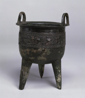 Image of "Tripod cauldron ding with taotie design."