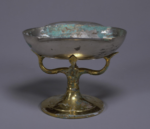 Image of "Silver ear cup with gilt bronze stand."