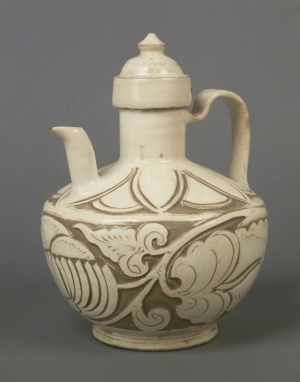 Image of "Ewer with scrolling plant design carved through white slip."