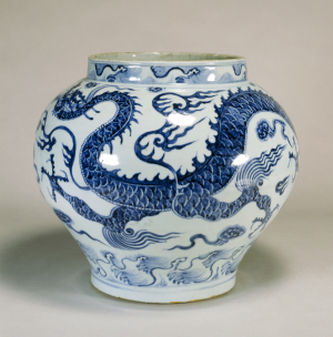 Image of "Jar with dragon and wave design in underglaze blue."