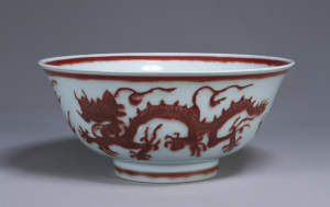 Image of "Bowl, Design of dragon in red glaze."