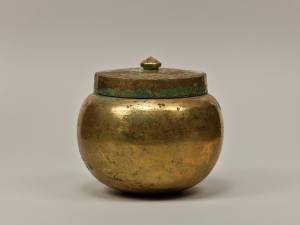 Image of "Cinerary urn, gilt bronze."