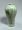 Image of "Celadon glazed vase with plum tree, bamboo, willow and waterfowl design in inlay."