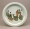 Image of "Dish with design of ladies and deer-drawn carts in overglaze enamels."