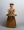 Image of "Seated miko (maiden in service of god)(terra-cotta tomb figurine)."