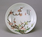 Image of "Dish with plum tree design in famille rose enamels."