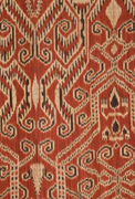 Image of "Slimut (Shawl) Figures and geometrical patterns in warp ikat weave on red-brown ground, Kalimantan, Indonesia, 19th century"