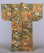 Image of "Karaori Garment (Noh Costume), Design of seigaiha waves, hananoshi bouquets, fans and moonflowers on green, red and brown checkered ground, Edo period, 18th century"