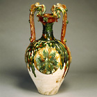 Image of "Vase with Dragon Handles,  Three-color glaze, Tang dynasty, 8th century (Important Cultural Property, Gift of Dr. Yokogawa Tamisuke)"