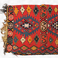 Image of "Rug, Tapestry weave; interlocking lozenge and geometric pattern design on red ground, Iraq, First half of 20th century"