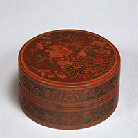 Image of "Covered Box, Pine, bamboo and plum tree design in polychrome lacquer inlay, China, Ming dynasty, Xuande era"