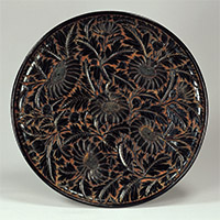Image of "Tray, Chrysanthemum design in carved black lacquer, Southern Song dynasty, 13th century"