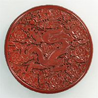 Image of "Covered Box, Dragon and cloud design in carved red lacquer, Ming dynasty, Xuande era (1426 - 35)"