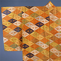 Image of "Karaori (Noh costume), Paired cranes in lozenge design on brown ground (detail), Edo period, 17th century"