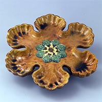 Image of "Six-foliate Tray, Three-color glaze with applied ornament, Tang dynasty, 7th - 8th century (Gift of Dr. Yokogawa Tamisuke)"