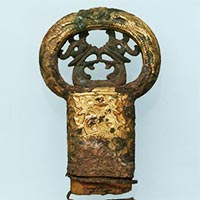 Image of "Gilt Bronze Ring Shaped Pommel with Phoenix Design, From Kamoinariyama tumulus, Takashima-shi, Shiga, Kofun period, 6th century"