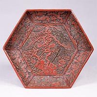 Image of "Hexagonal Tray, Design of bamboo, plum tree, and pine forming the character for "longevity" in carved colored lacquer, Ming dynasty, Jiajing era (1522–66)"