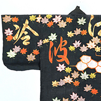 Image of "Katabira (Unlined summer garment), Cracked ice, maple leaf, and Chinese character design on black ramie ground (detail), Edo period, 18th century"
