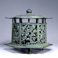 Image of "Hanging Lantern, Plum and bamboo design in openwork, Excavated at Sen'yoji temple site, Chibadera-machi, Chuo-ku, Chiba-shi, Muromachi period, dated 1550 (Important Cultural Property, Gift of Mr. Hatano Yujiro)"