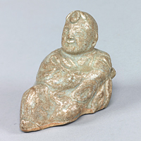 Image of "Celadon Glazed Water Dropper in shape of Boy, Excavated from Kinugasajo Sutra Mound, Southern Song dynasty, 12th century"