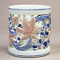 Image of "Brush Stand, Lotus arabesque in openwork with designs in underglaze blue and red, Korea, 19th&ndash;20th century"