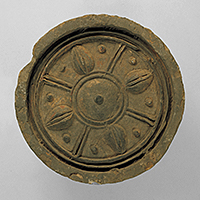 Image of "Round Eave Tile, Spoke and lotus flower design, Probably excavated from Pyeongyang, Korea, Three Kingdoms period (Goguryeo), 4th&ndash;5th century"
