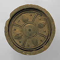 Image of "Round Eave Tile, Spoke and lotus flower design, Probably excavated from Pyeongyang, Korea, Three Kingdoms period (Goguryeo), 4th&ndash;5th century"