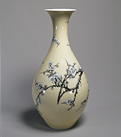 Image of "Jar, White porcelain with grape scroll design in relief, By Itaya Hazan, Showa era, 20th century"