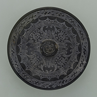 Image of "MirrorDesign of animal mask with the inscribed date “Yanxi 7”, China, Purportedly excavated from a tumulus near Pyongyang, Korea, Eastern Han dynasty, dated 164"
