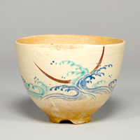 Image of "Tea Bowl with Waves and a Crescent MoonStoneware with overglaze enamel, Studio of Ninsei, Edo period, 17th century"