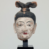 Image of "Head of a Female Worshipper, Kumtura Caves, China, ChinaŌtani collection, 7th-8th century"
