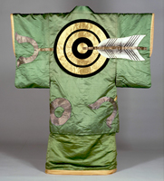 Image of "Haori (Kabuki costume), Target and arrow design on light green satin ground, Formerly used by Bando Mitsue, Edo period, 19th century (Gift of Ms. Takagi Kiyo)"