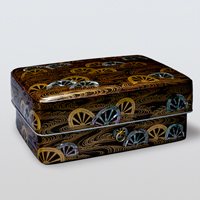 Image of "Tebako (Cosmetic Box), Design of cart wheels in water with maki-e lacquer and mother-of-pearl inlayEdo period, 17th-18th century"