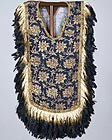 Image of "Ryoto Vest (Bugaku costume),  Peony and arabesque design on dark blue ground, gold brocade, Formerly preserved at  Amano-sha, Mount Koya, Nanbokucho period, 14th century (Important Cultural Property, on exhibit through September 4, 2011)"