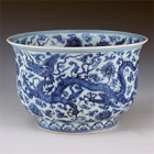 Image of "Bowl, Lotus and dragon design in underglaze blue, Jingdezhen ware, China, Ming dynasty, Zhengde era (Lent by the Shanghai Museum)"