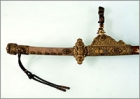 Image of "Kazari-tachi Style Sword Mounting, With mother-of-pearl inlay decoration and gold fittings on nashiji laqauer ground, Heian period, 12th century (National Treasure)"