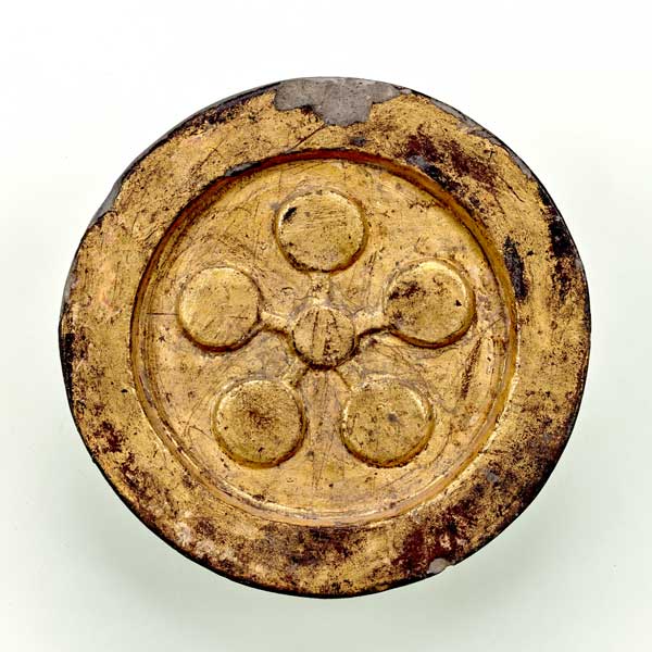 Image of "Round Eave Tile with Gold Leaf, with plum brossom crest, From Yuraku-cho, Chiyoda-ku, Tokyo 	Edo period, 17th century"