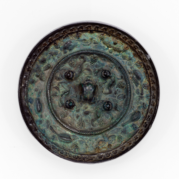 Image of "Mirror with Sea Beasts and GrapesFound at Matsuyama Tumulus, NaraKofun period, 7th century"