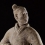 Pottery figure of standing archer
